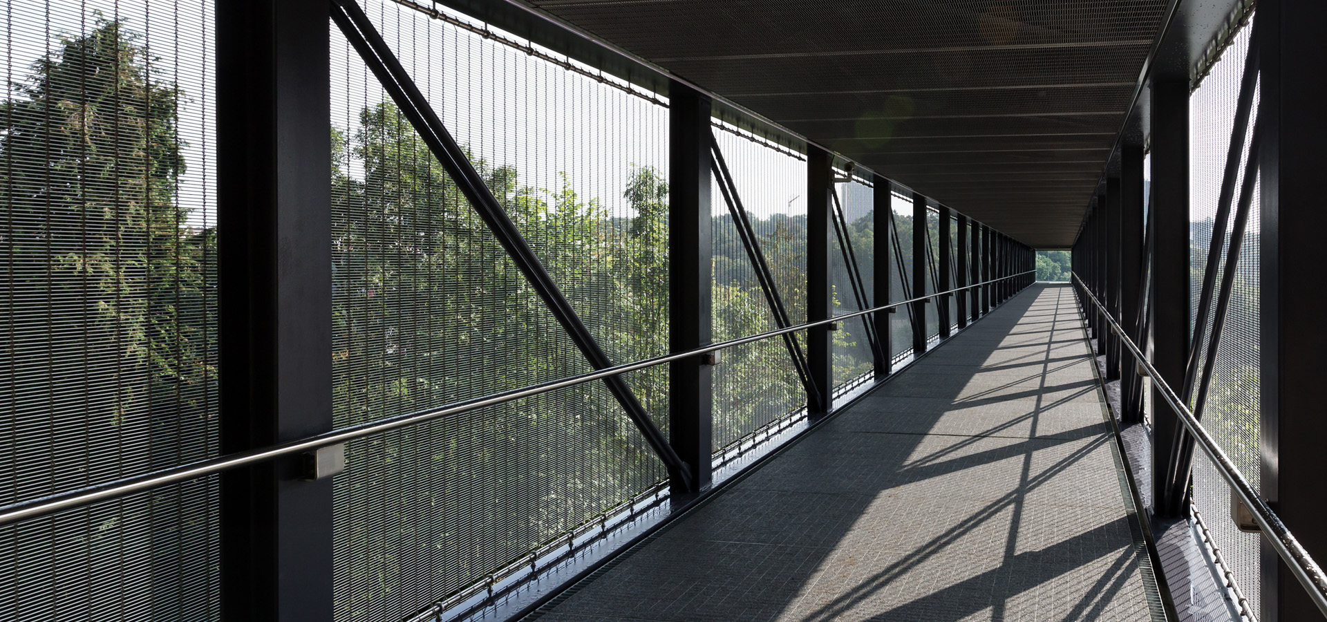 Bridge cladding with HAVER architectural wire mesh as effective fall protection