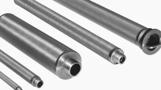 Five cylindrical stainless‑steel filter candles of different sizes with Porostar mesh laminate and threaded connections on a white background.