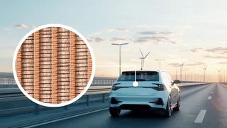 Electric car on the motorway at sunrise, with a detailed close-up of EMC wire mesh for electromagnetic shielding in the vehicle interior.