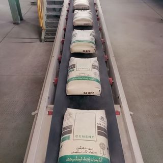 several bags on a conveyor belt