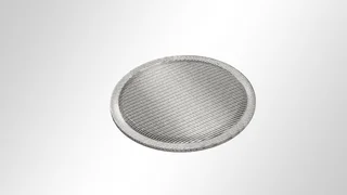 Multi-layered filter disc with edge zone compression