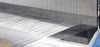 Warp and weft wires on a weaving machine