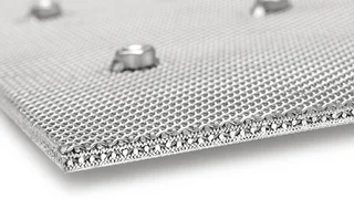 Detailed close‑up of a cross‑section of a Porostar filter plate with visible connecting elements.